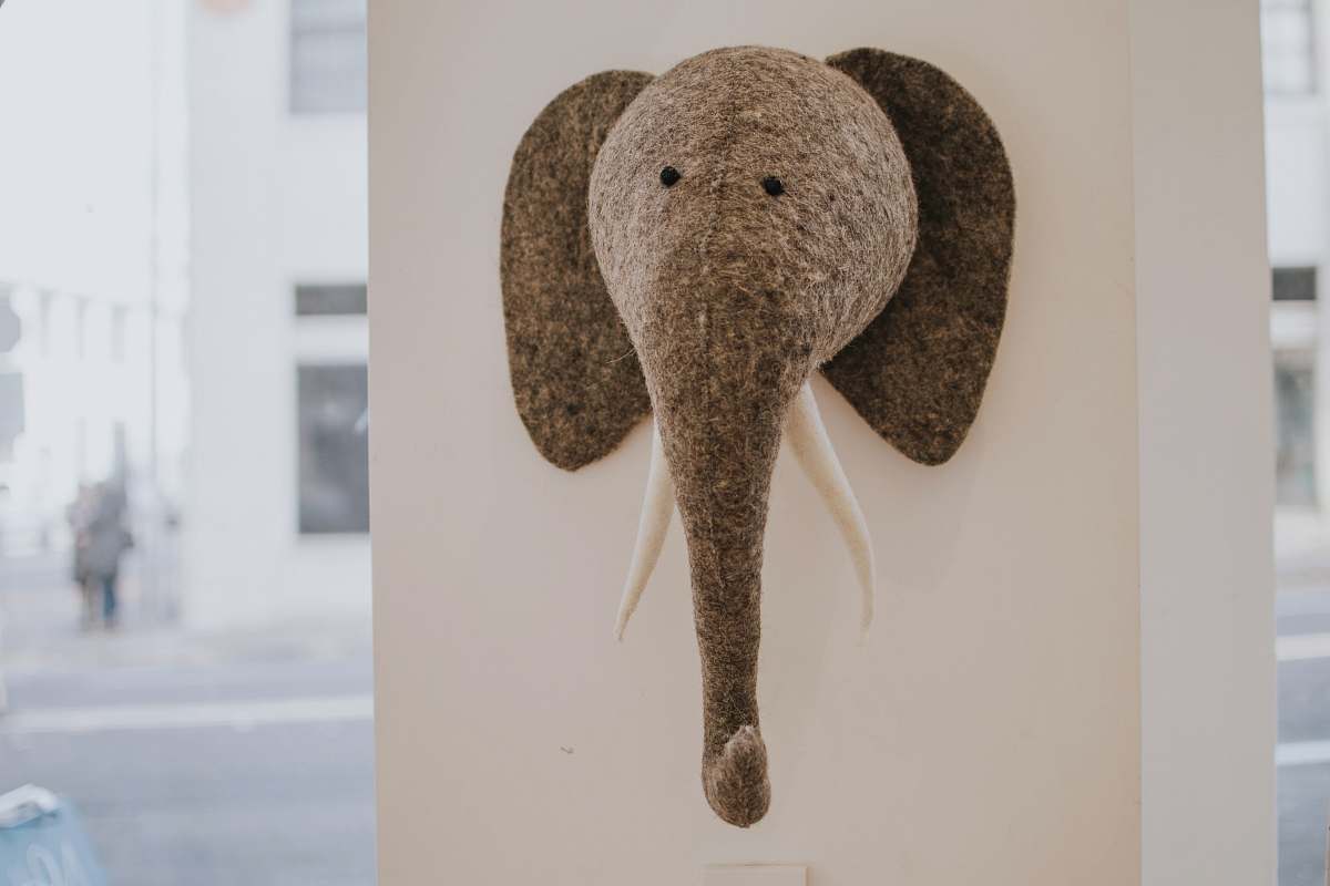 portland gray elephant head figure hanging on wall elephant